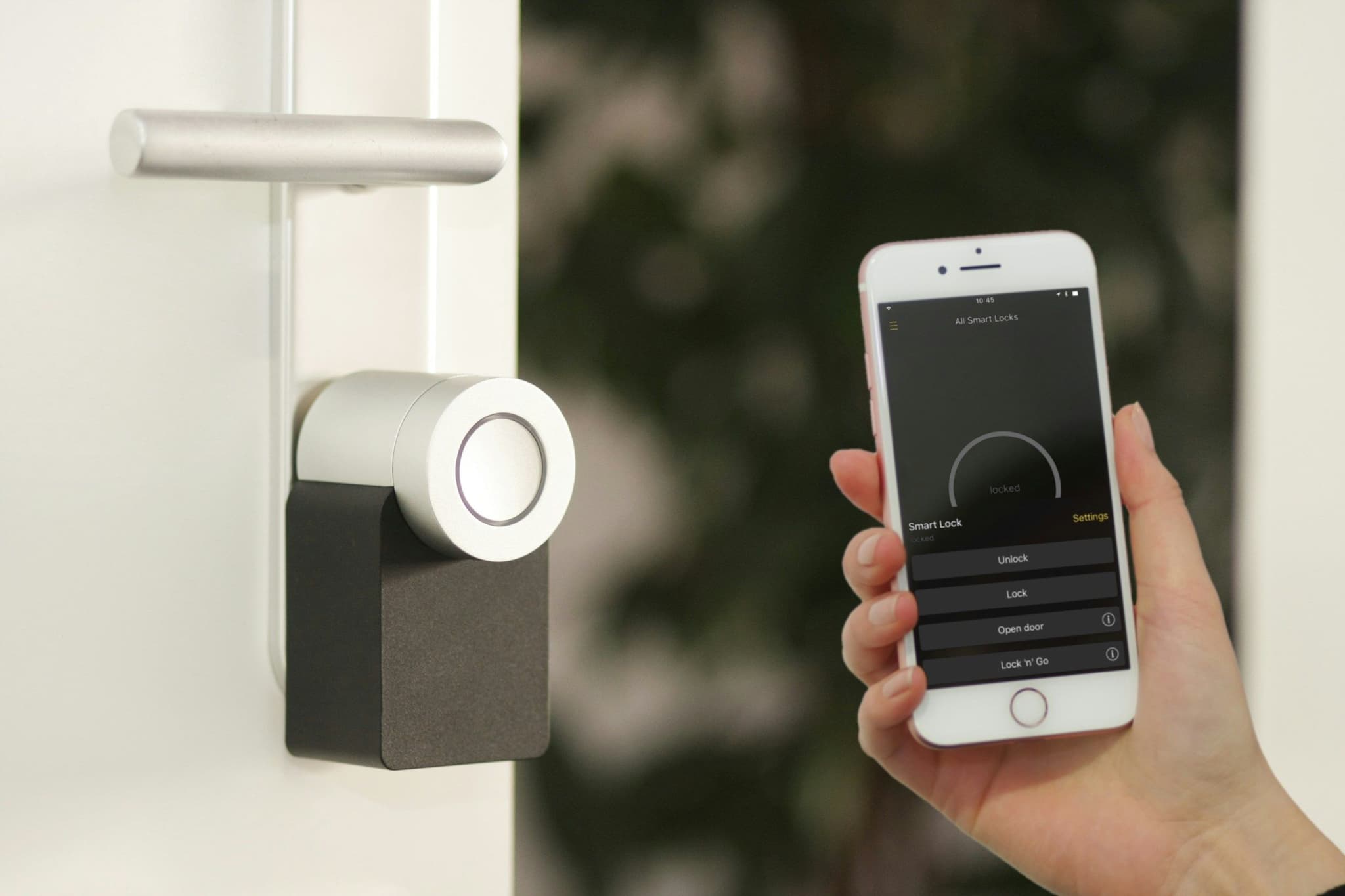 Smartphone held up at the front door